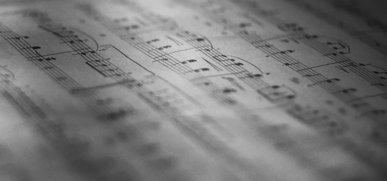 Close-up of sheet music with blurred background